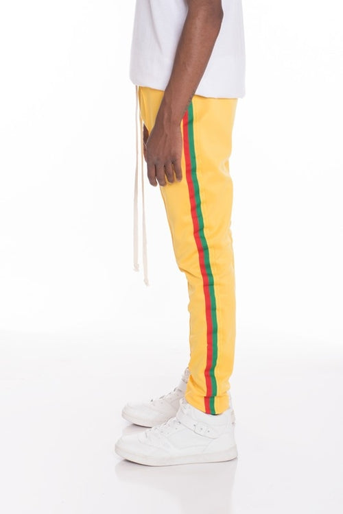 PANTALONES DE CHÁNDAL CON RAYAS DE RASTA