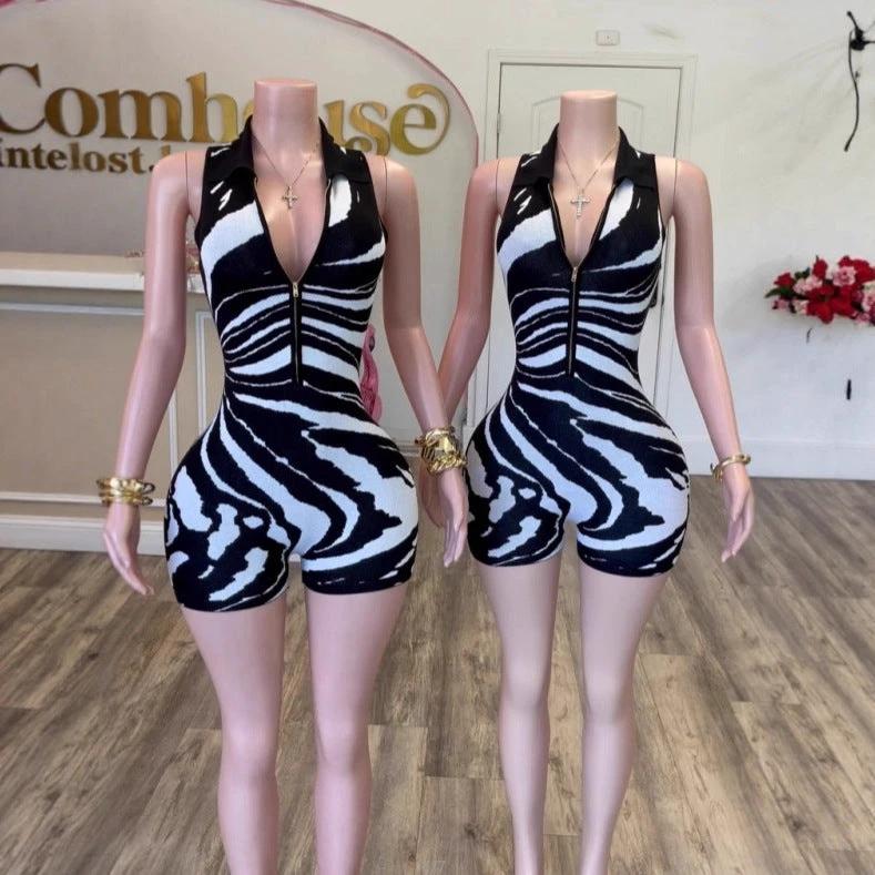 Fashionable Striped Romper With A Half-zip Front And Collar