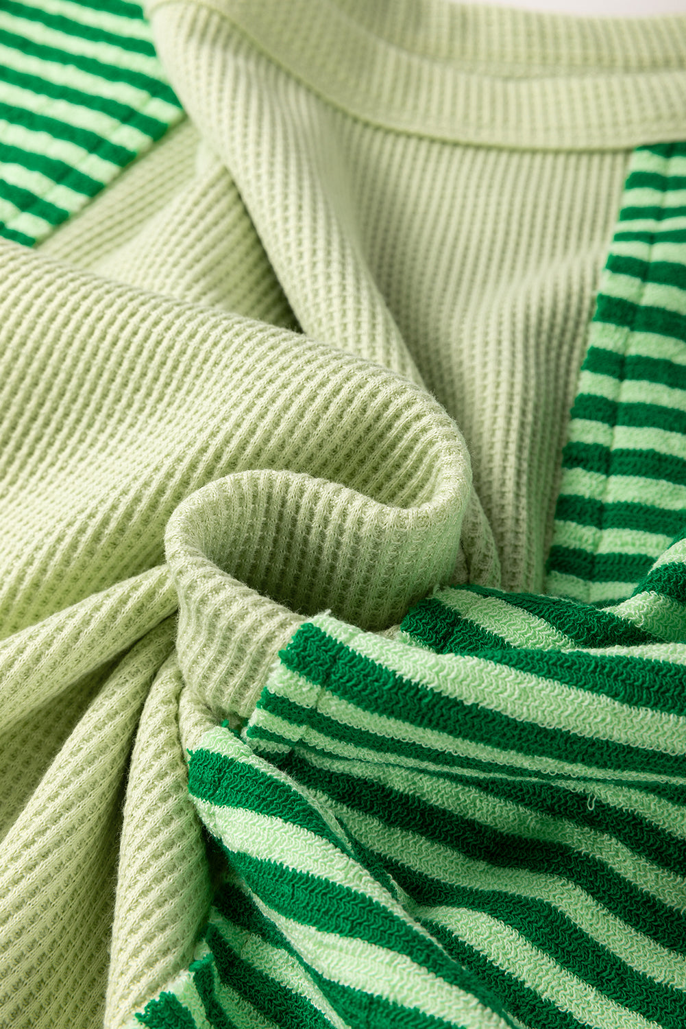 Top de punto colorblock texturizado a rayas patchwork verde menta de manga 3/4