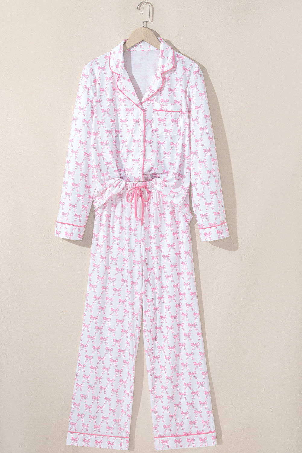 Conjunto de pijama suave de camisa de manga larga y pantalón con estampado de lazos azul cielo
