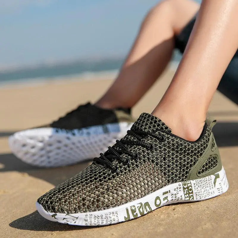 Zapatos casuales para hombre, zapatillas transpirables, zapatos de tabla calados con cordones