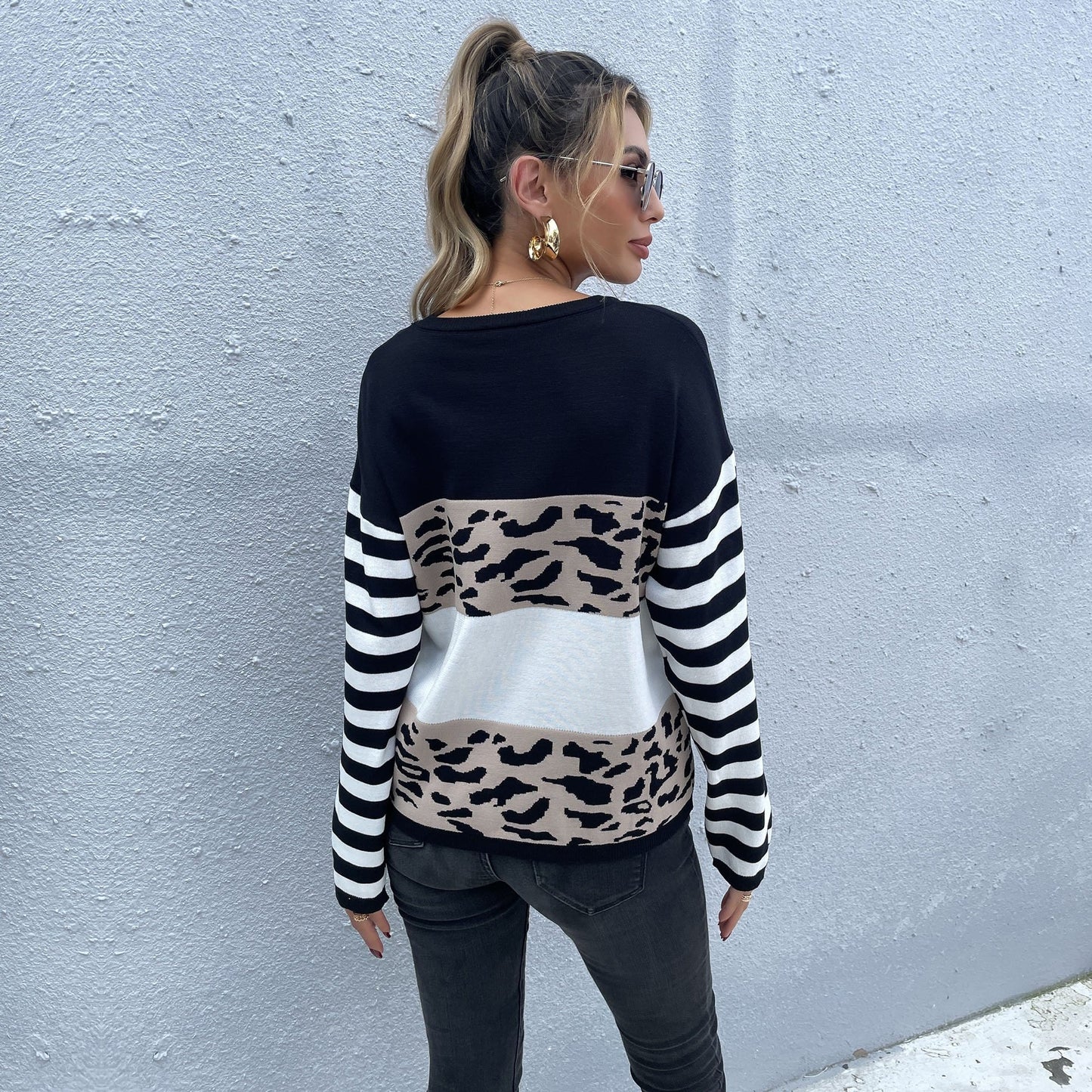 Suéter de punto con bloques de color y estampados mixtos