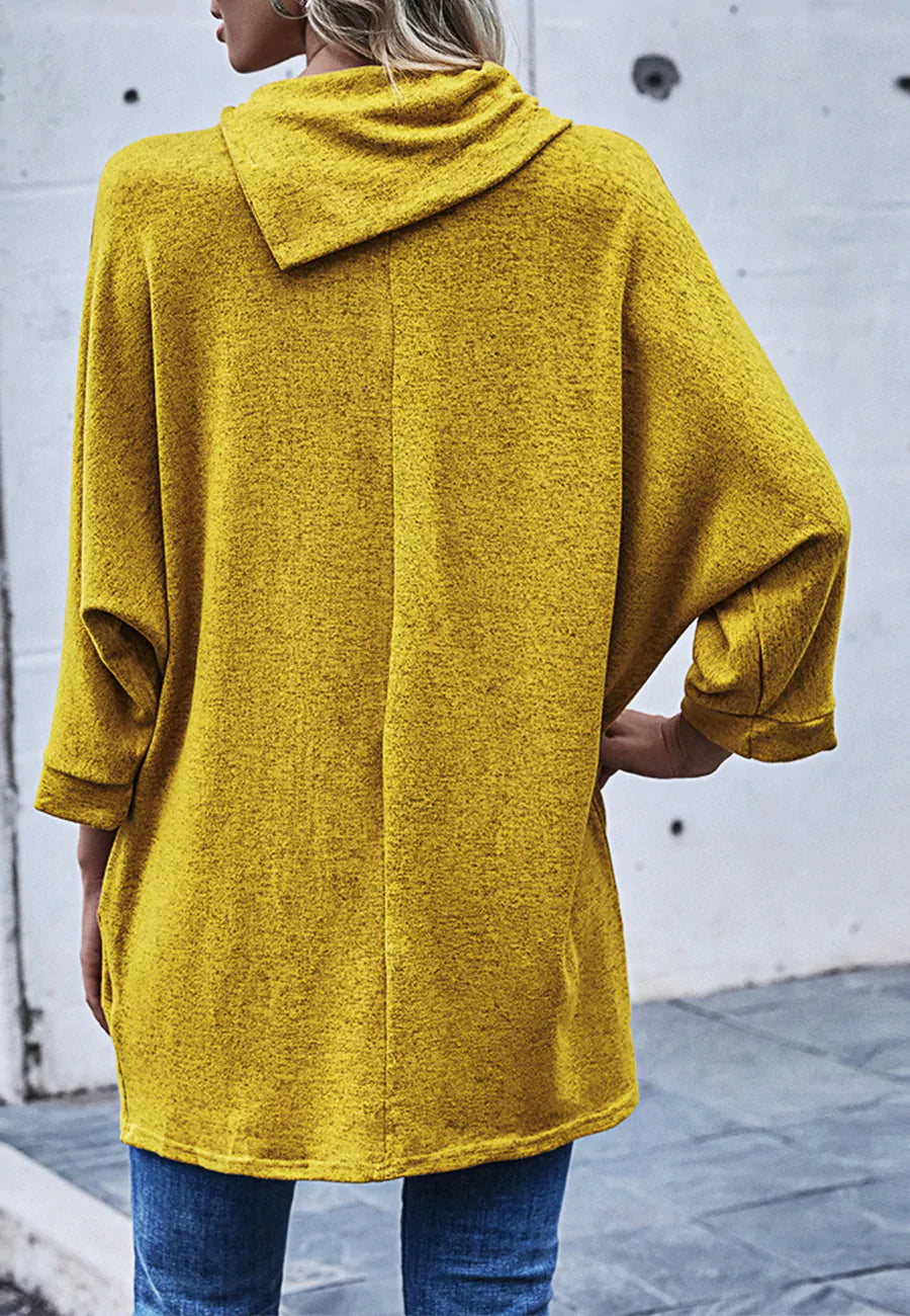 Jersey con cuello de botones asimétrico