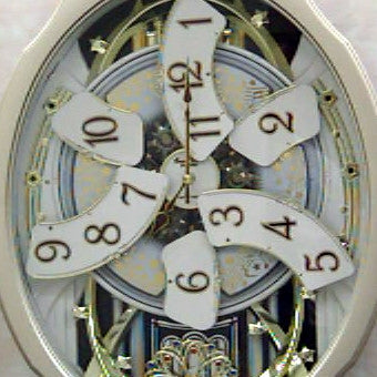Reloj de pared con péndulo de cara móvil - Reproduce melodías cada hora