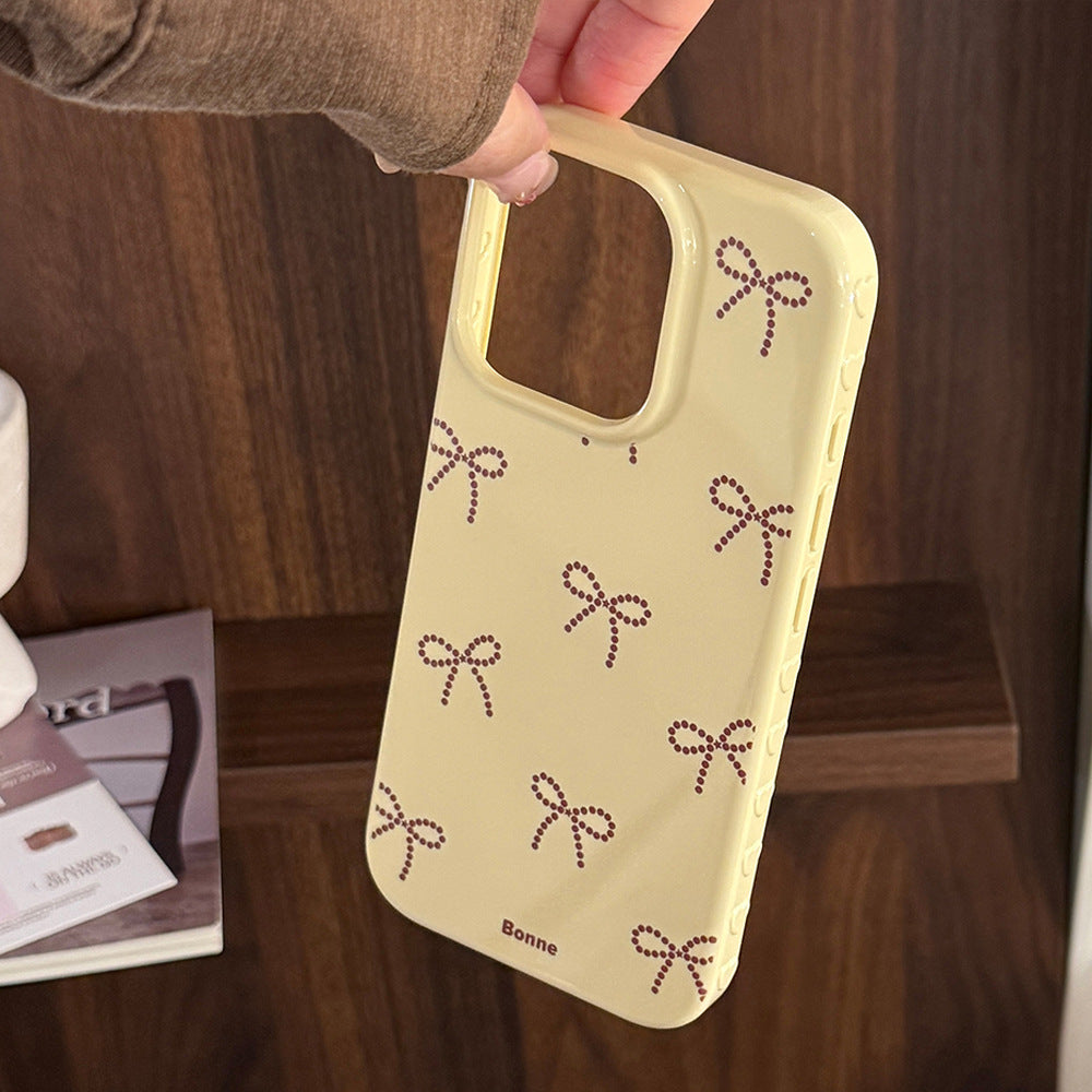 Soporte de lazo de lunares dorados, funda para móvil Apple 17 iphone16promax, apta para 14 personalidades 16 todo incluido.