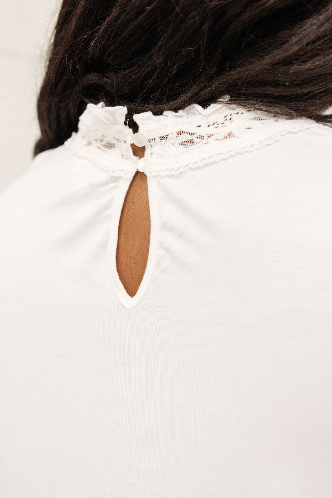 Imagina este top en blanco roto