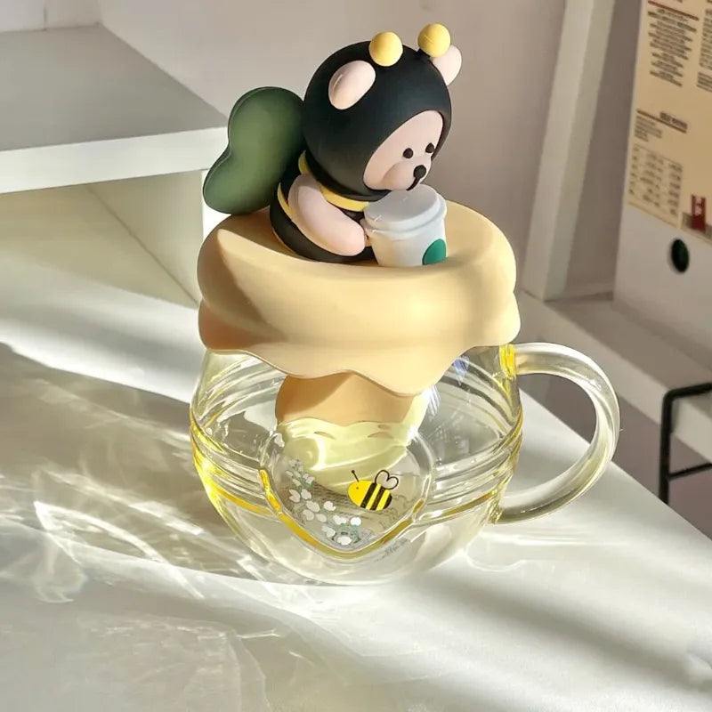 Taza infusora de té con diseño de oso y miel