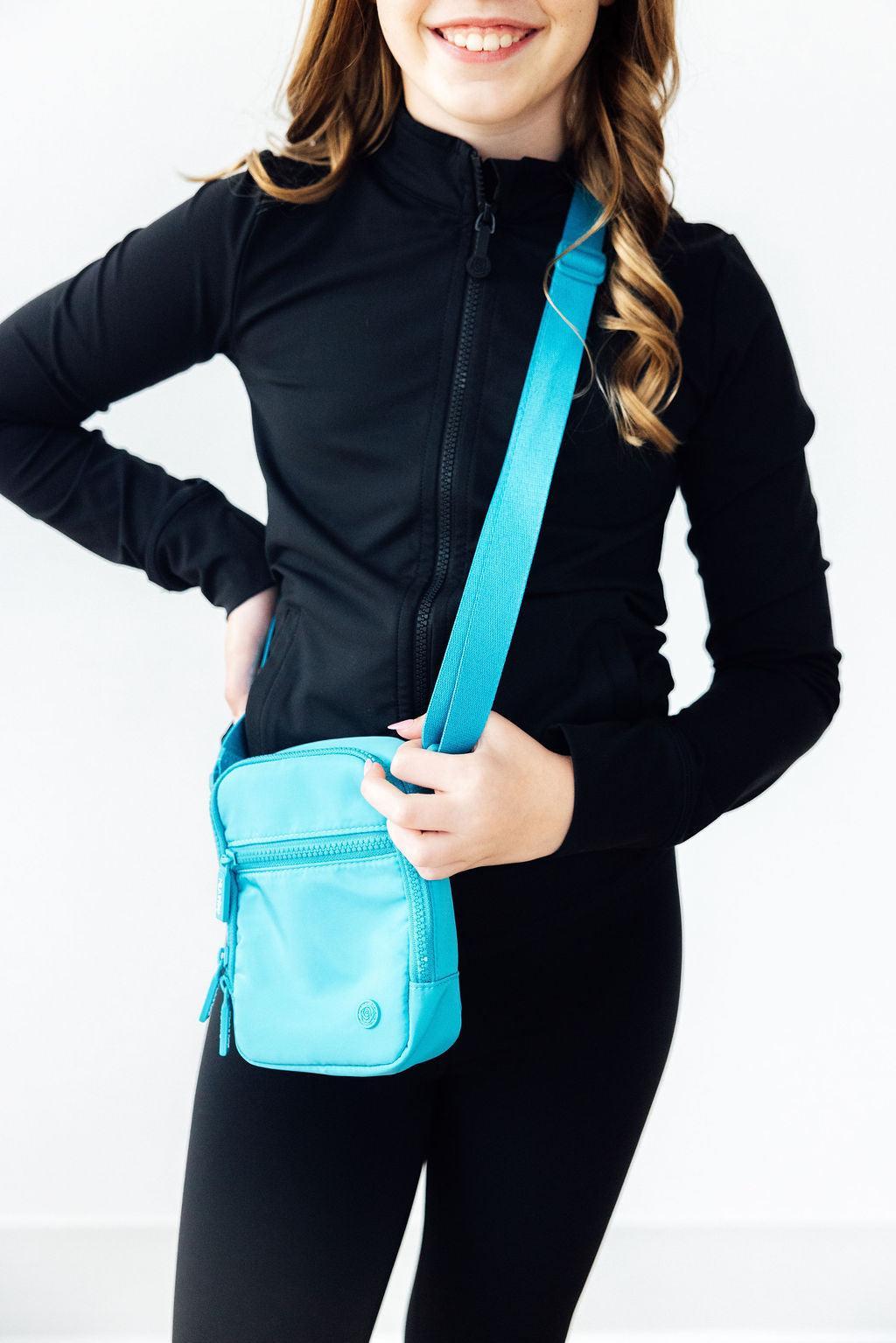 Bolso cruzado turquesa