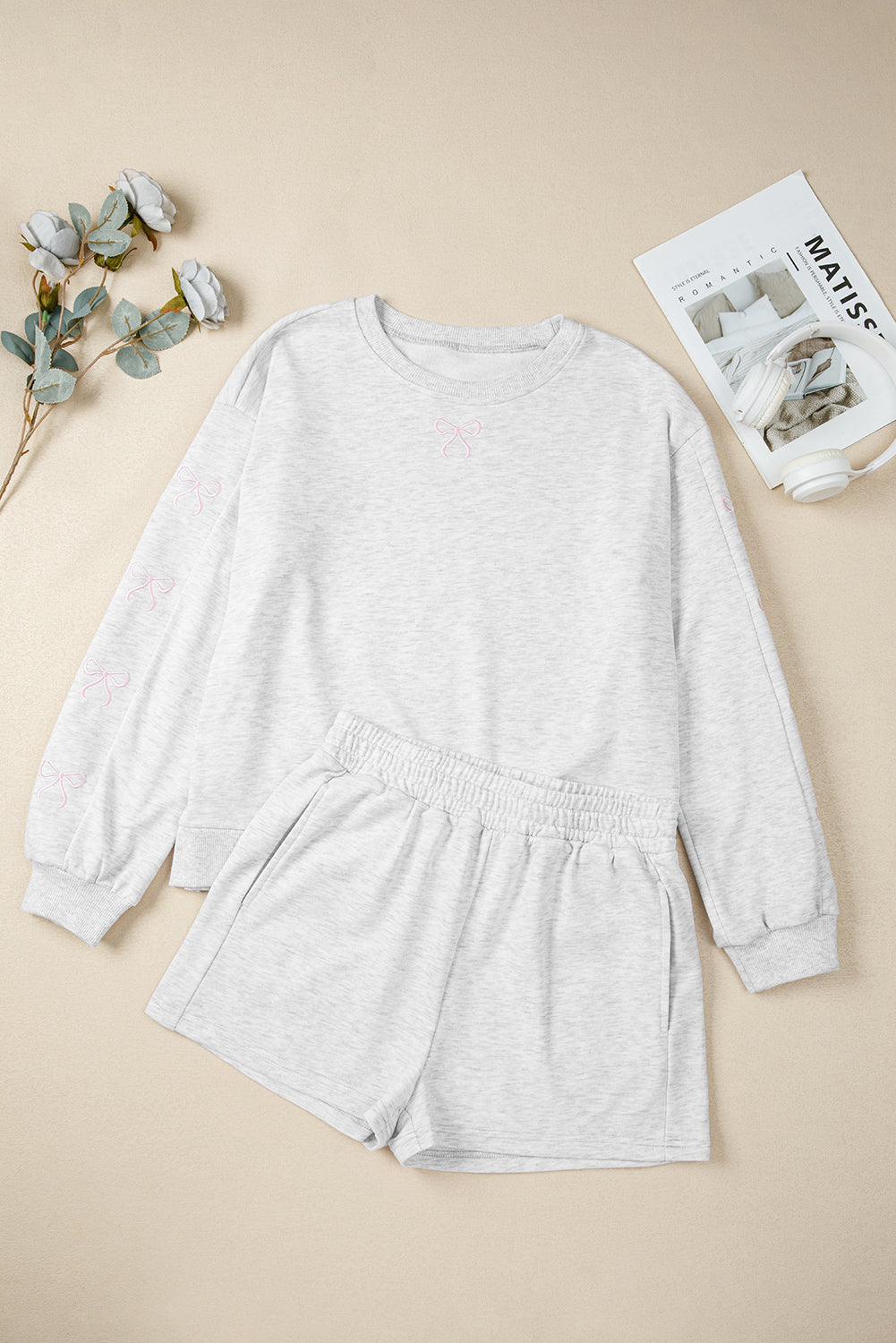 Conjunto de 2 piezas de short rosa sobre y mangas abullonadas con detalle bordado de lazo y jersey