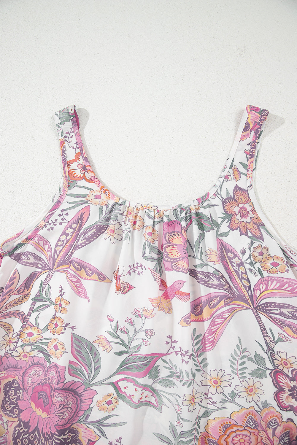 Minivestido sin mangas con cuello de lazo con estampado floral multicolor y flecos