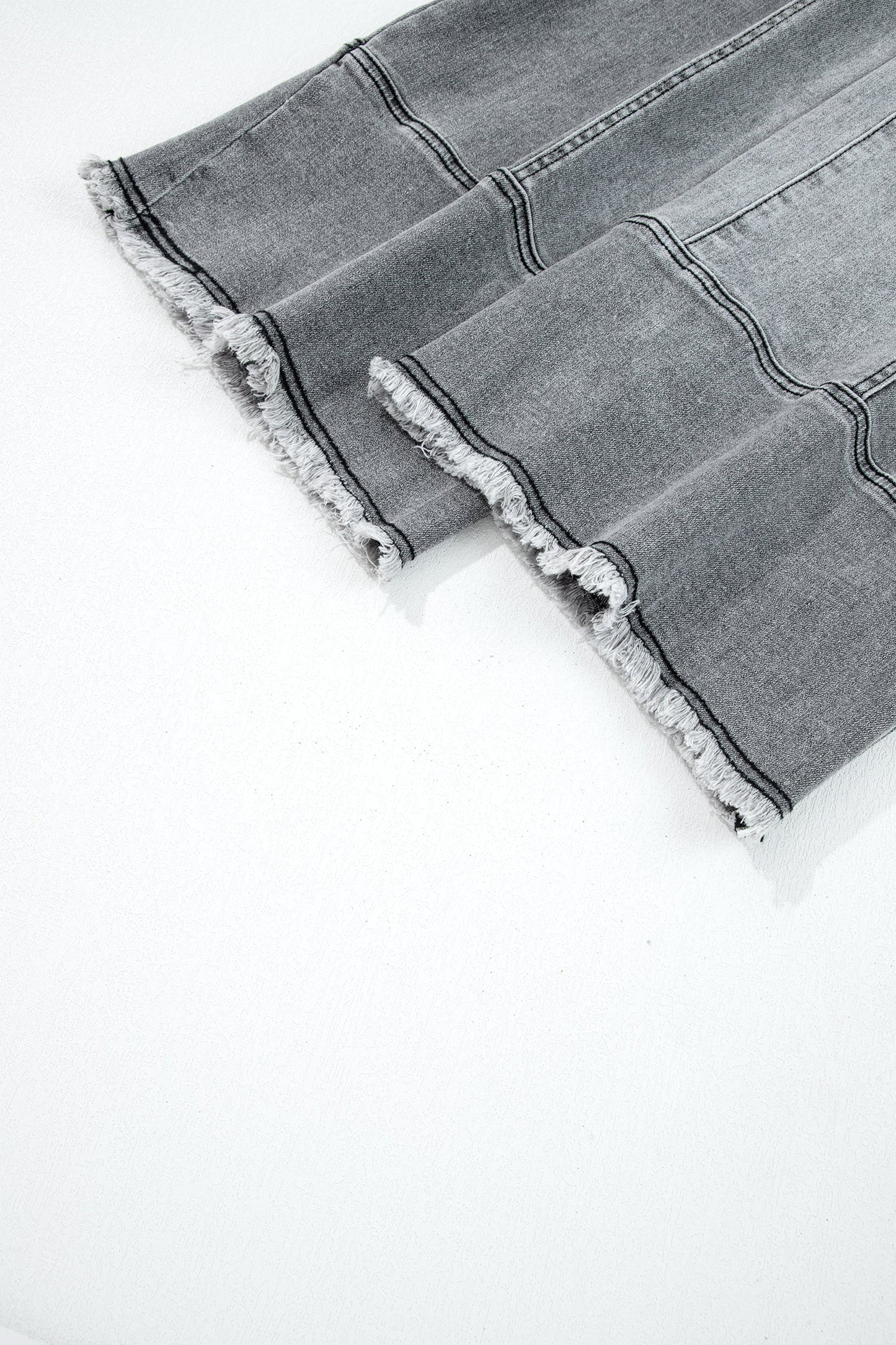 Pantalones vaqueros de pierna ancha con cordón azul de Prusia, detalle de costura y dobladillo sin rematar