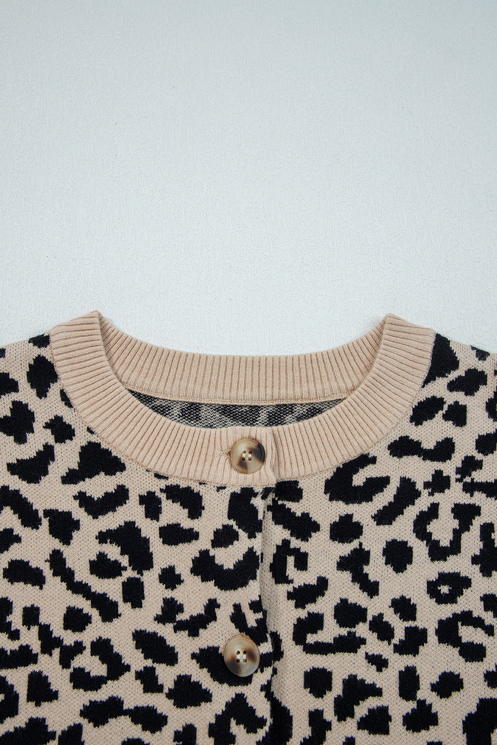 Cárdigan de punto de hombros caídos con estampado de leopardo naranja