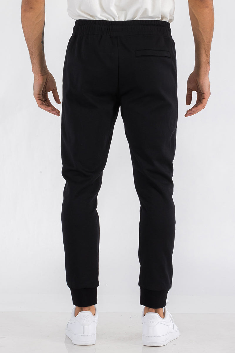 PANTALONES DE ALGODÓN MELANGE