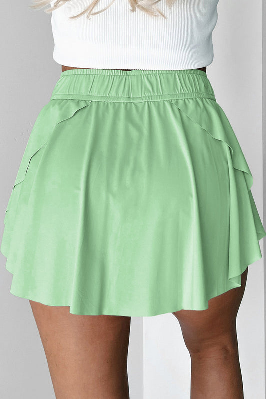Falda pantalón de tenis forrada de talle alto con cordón verde claro