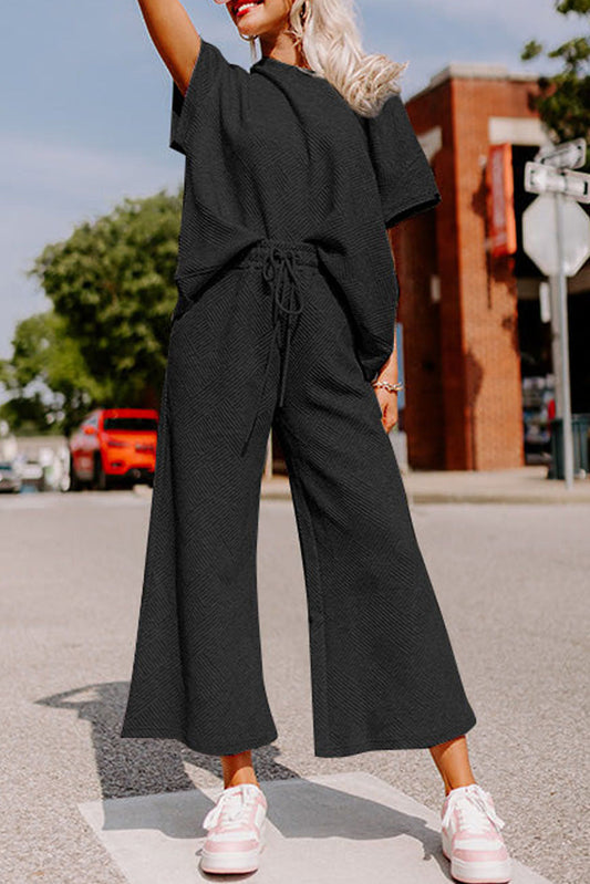 Conjunto de camiseta holgada texturizada negra y pantalón con cordón