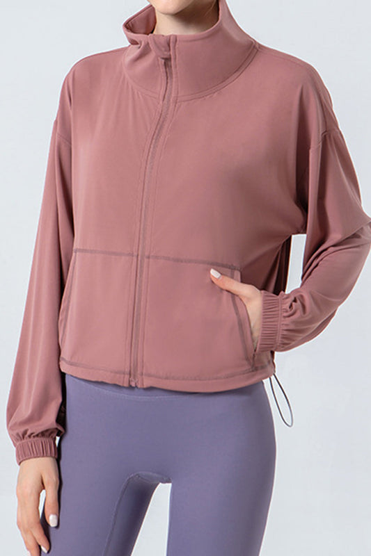 Chaqueta deportiva con cremallera, cordón ajustable y hombros caídos