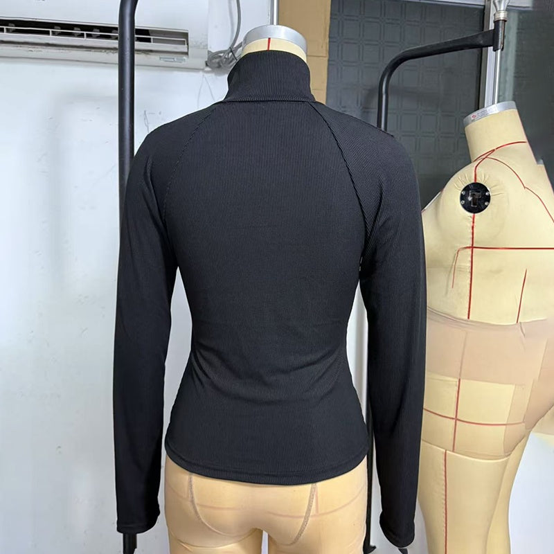 Suéter de punto de cuello alto con media cremallera y diseño acanalado sólido