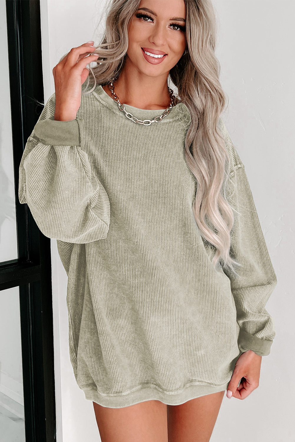 Sudadera Rosa Sólida de Punto Acanalado y Cuello Redondo