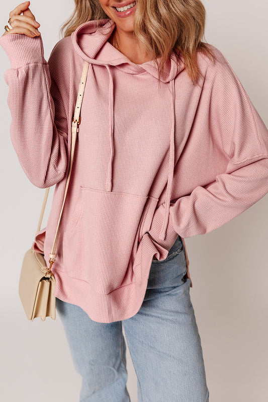 Sudadera con capucha grande, de punto gofre rosa claro, forrada de felpa, con dobladillo asimétrico (más corto por delante que por detrás)