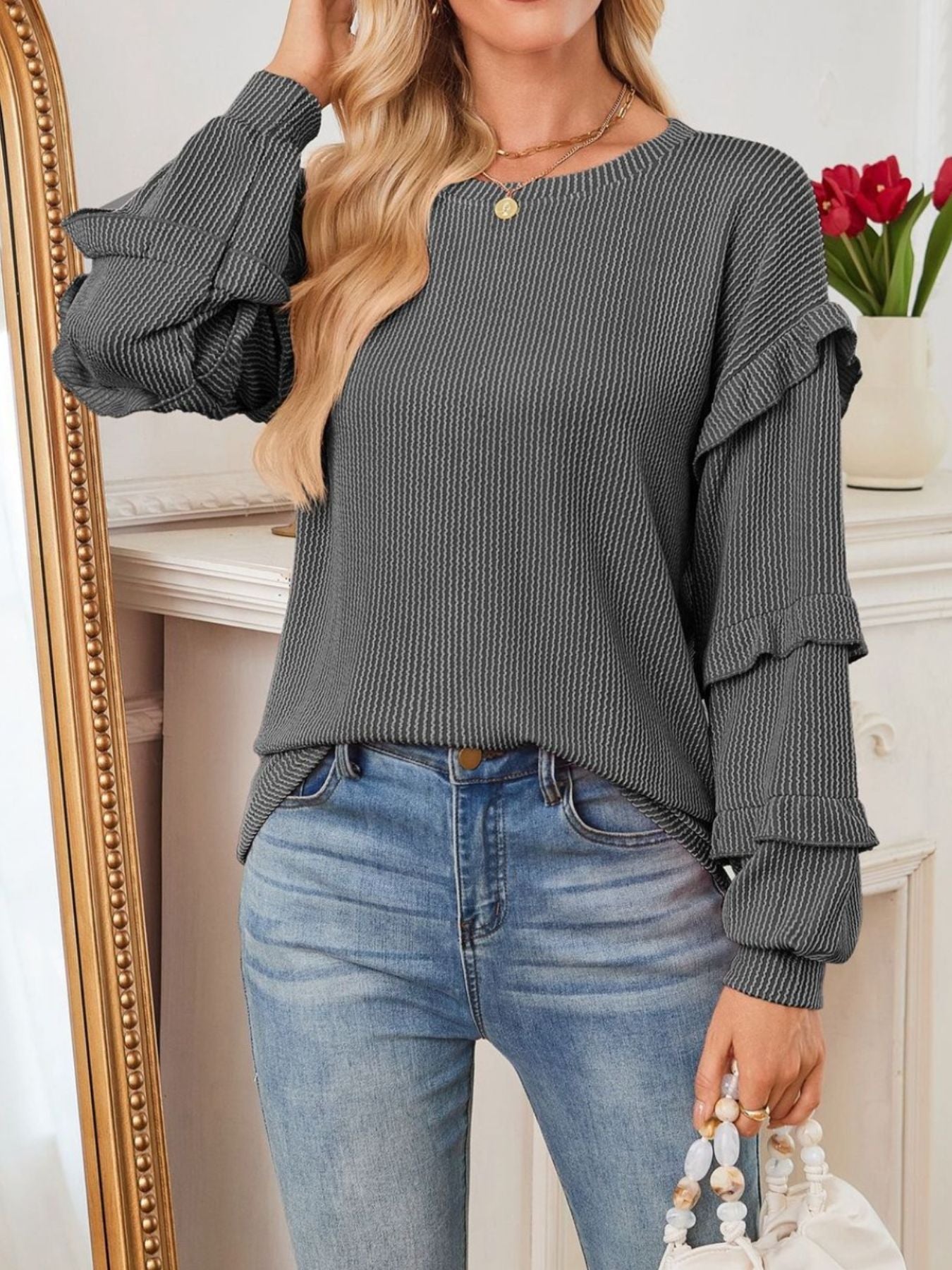 Blusa de manga larga con volantes