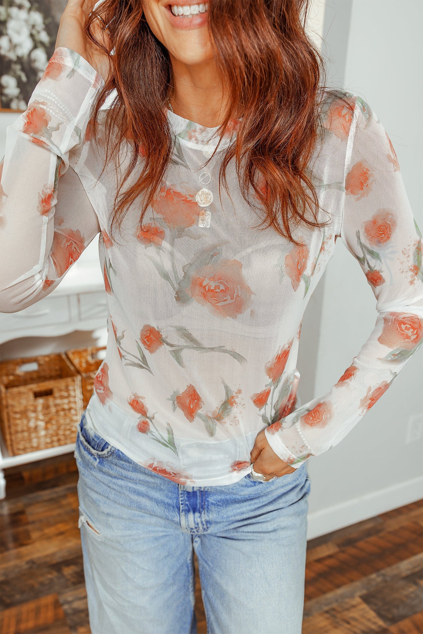 Top casual de manga larga de malla con cuello redondo y estampado floral