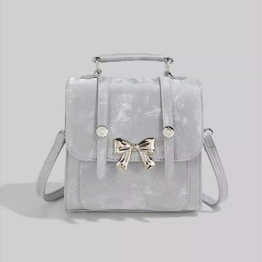 Mochila pequeña de lujo a la moda. Consulta la tabla de tallas en "más detalles".