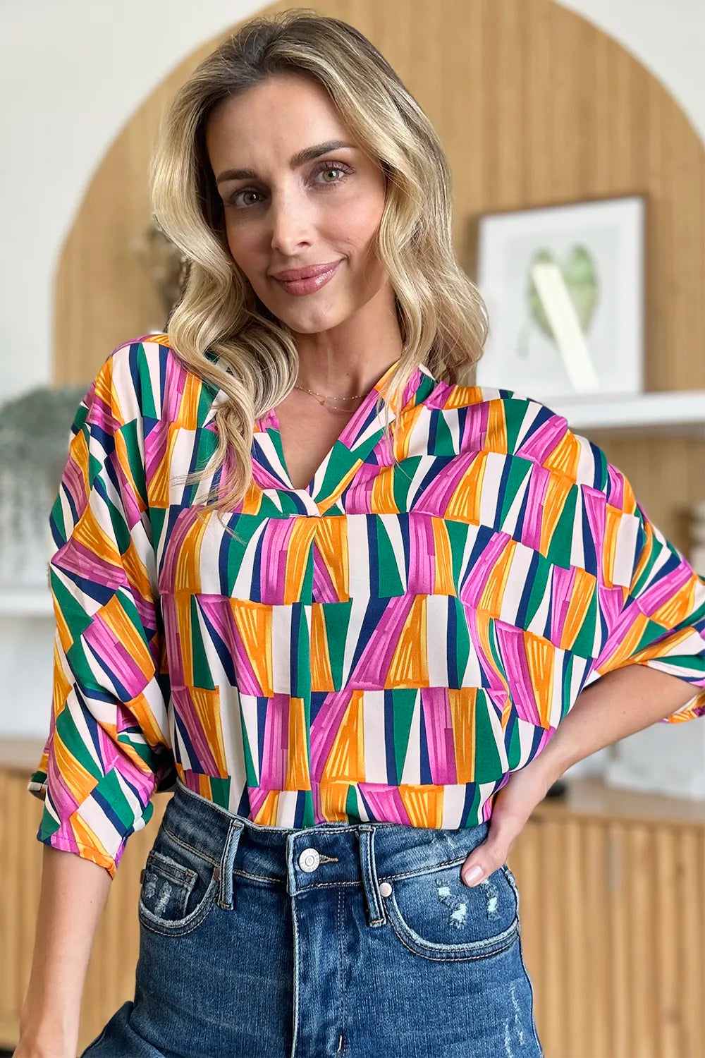 Top de manga dolman con muescas y estampado geométrico "Double Take" de talla grande