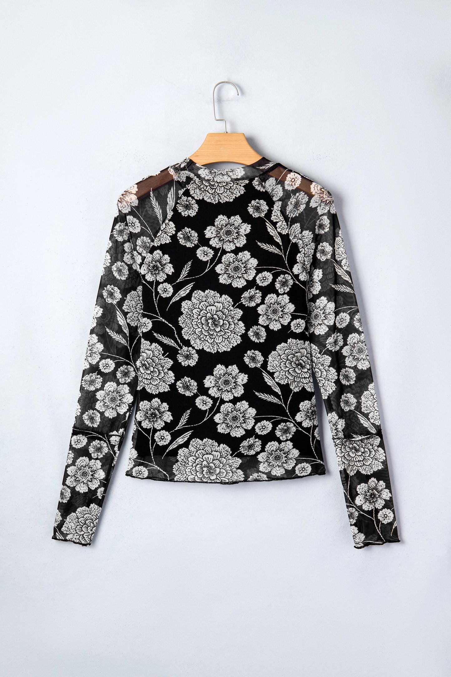 Top de malla de manga larga con agujero para el pulgar y estampado floral marrón