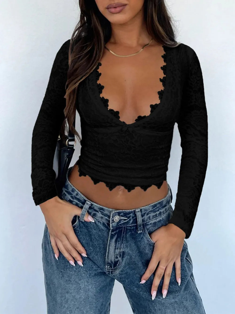 Top de encaje de manga larga con cuello de pico Devine