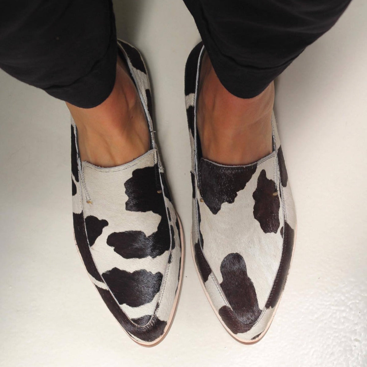 Women's Pointed-Toe Cow Print Flats
