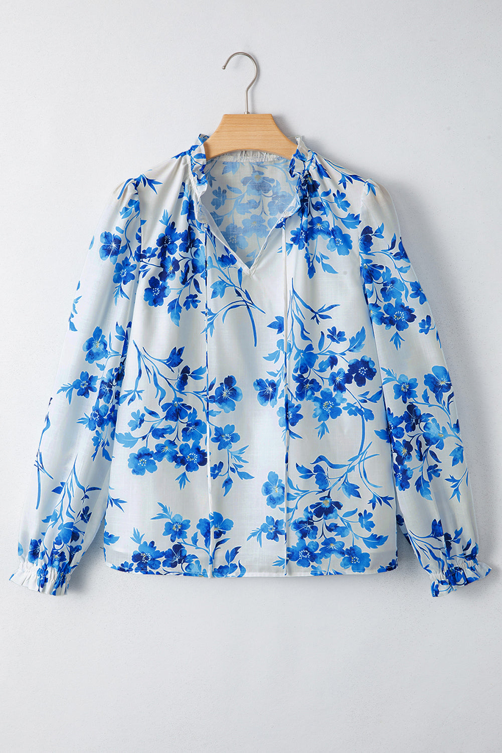 Blusa Azul Floral de Manga Larga con Cuello V y Cordones