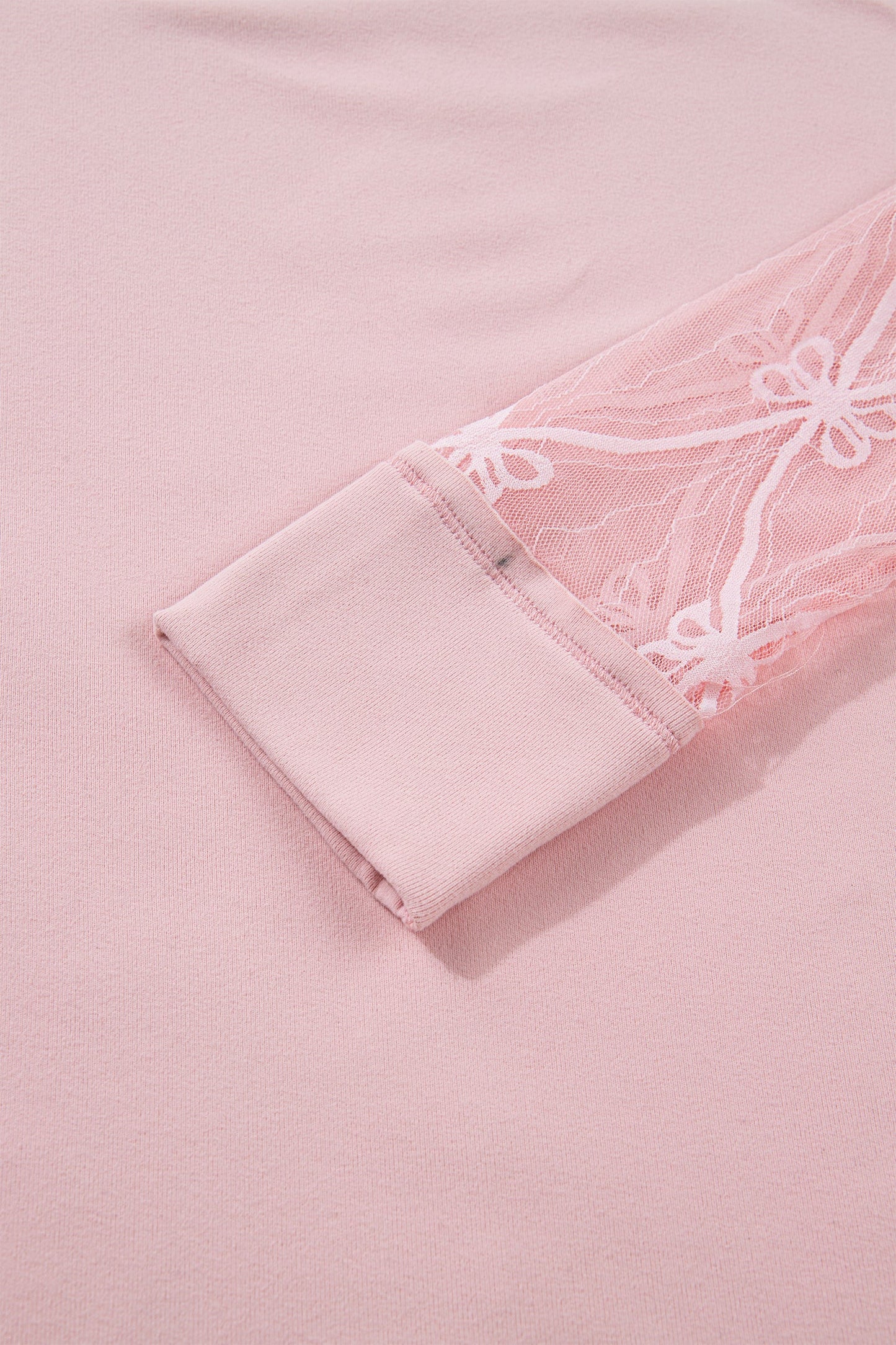 Camiseta de manga larga con retazos texturizados y lazo, color rosa claro liso