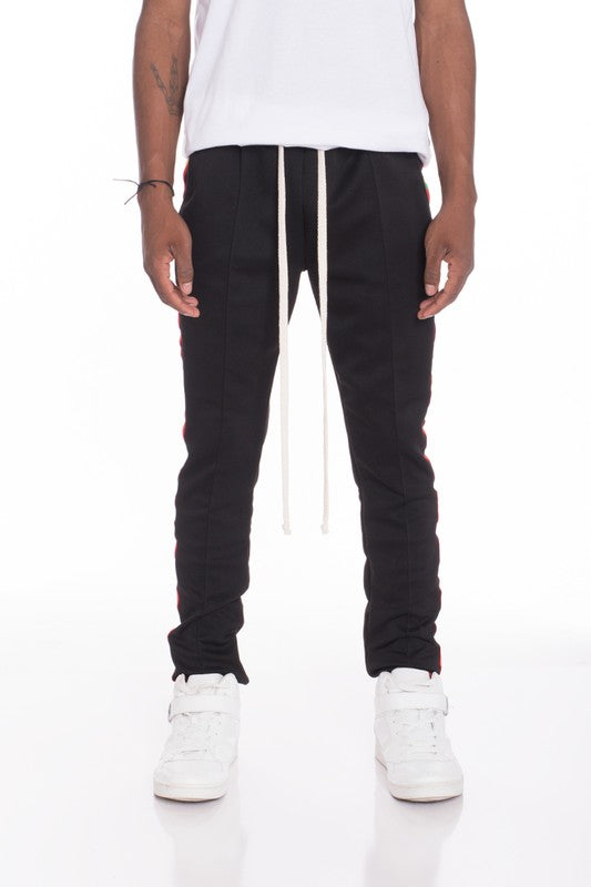 PANTALONES DE CHÁNDAL CON RAYAS DE RASTA