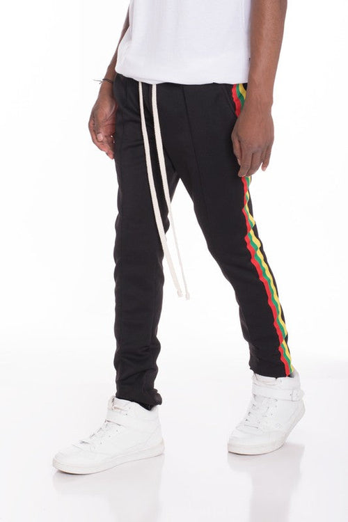 PANTALONES DE CHÁNDAL CON RAYAS DE RASTA