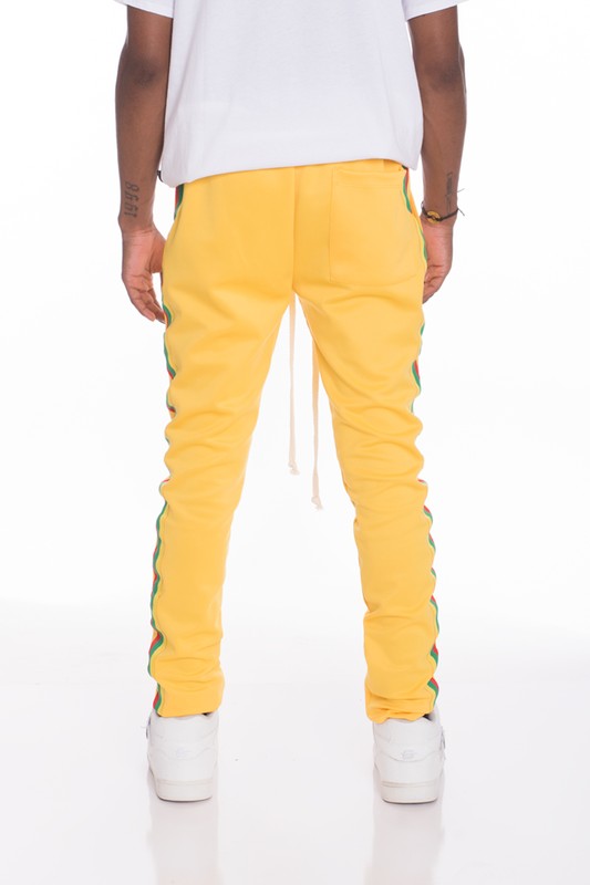 PANTALONES DE CHÁNDAL CON RAYAS DE RASTA