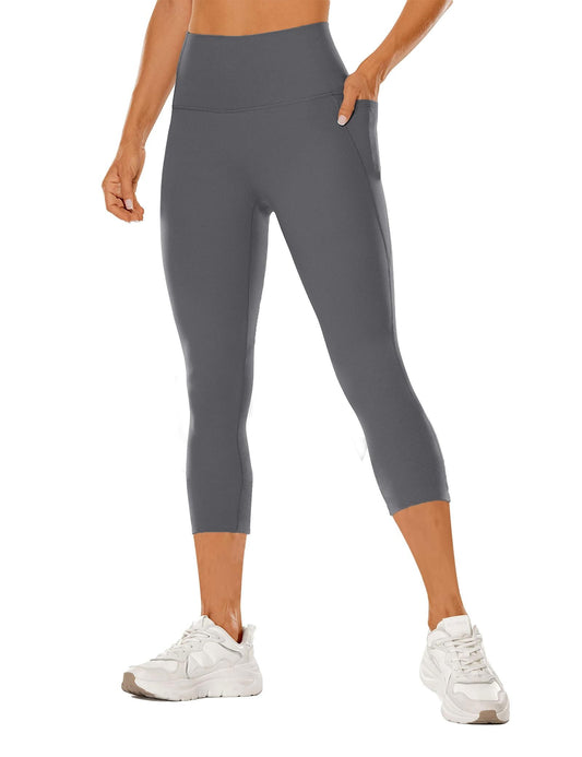 Pantalones de yoga de talle alto y corte capri con bolsillos