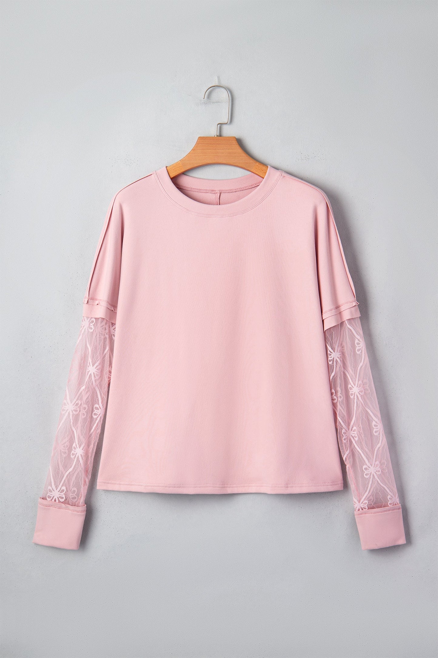 Camiseta de manga larga con retazos texturizados y lazo, color rosa claro liso
