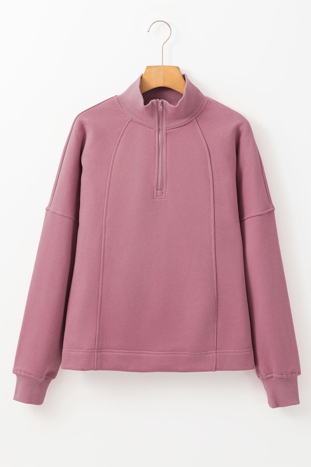 Sudadera lisa fucsia con cremallera y cuello, hombros caídos