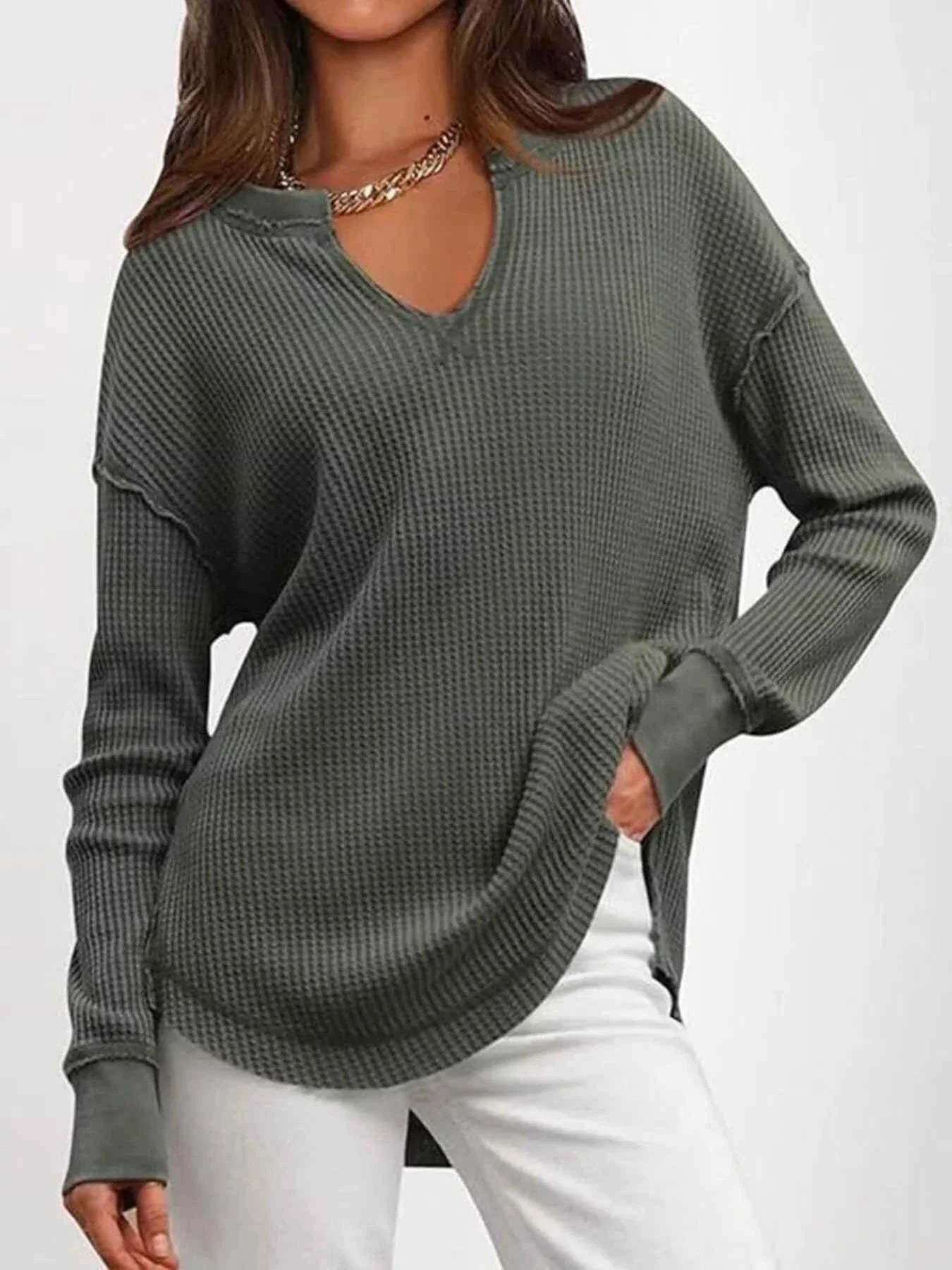 Camiseta de manga larga con aberturas y muescas