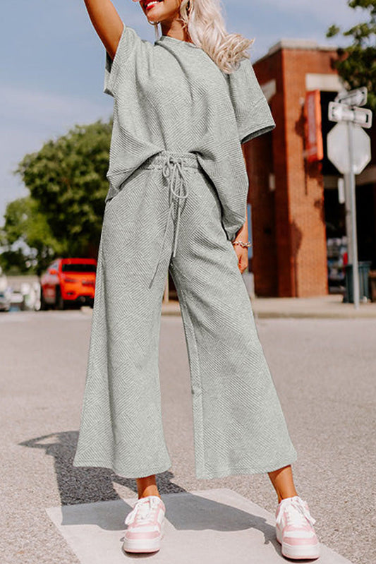 Conjunto de camiseta holgada texturizada gris y pantalones con cordón