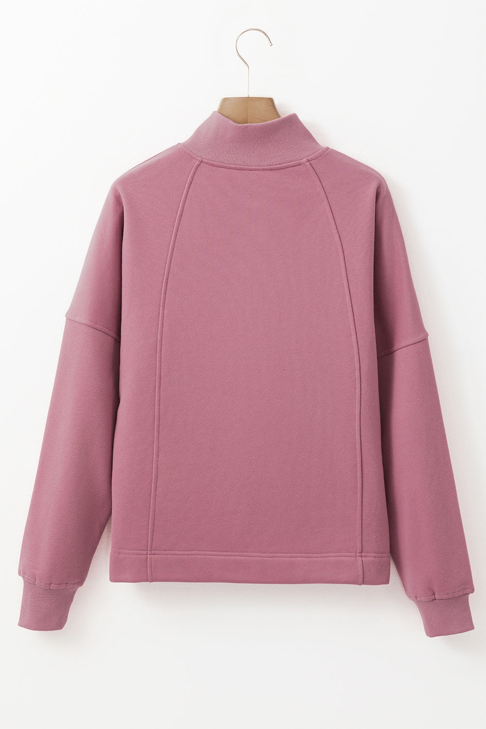 Sudadera lisa fucsia con cremallera y cuello, hombros caídos