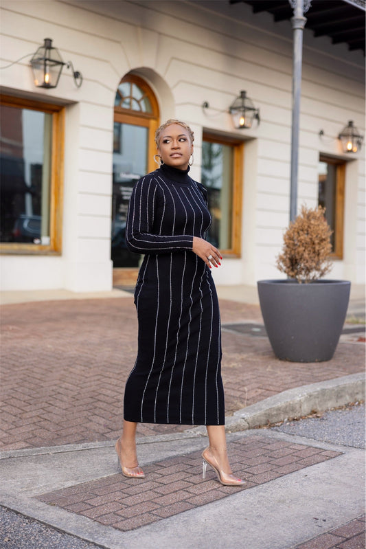 Vestido de punto negro con adornos
