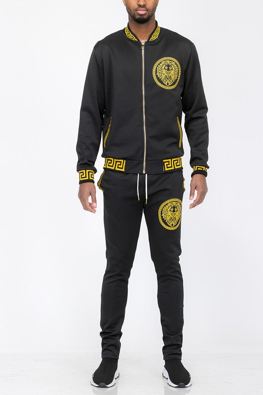Conjunto de chándal para hombre negro con ribete dorado