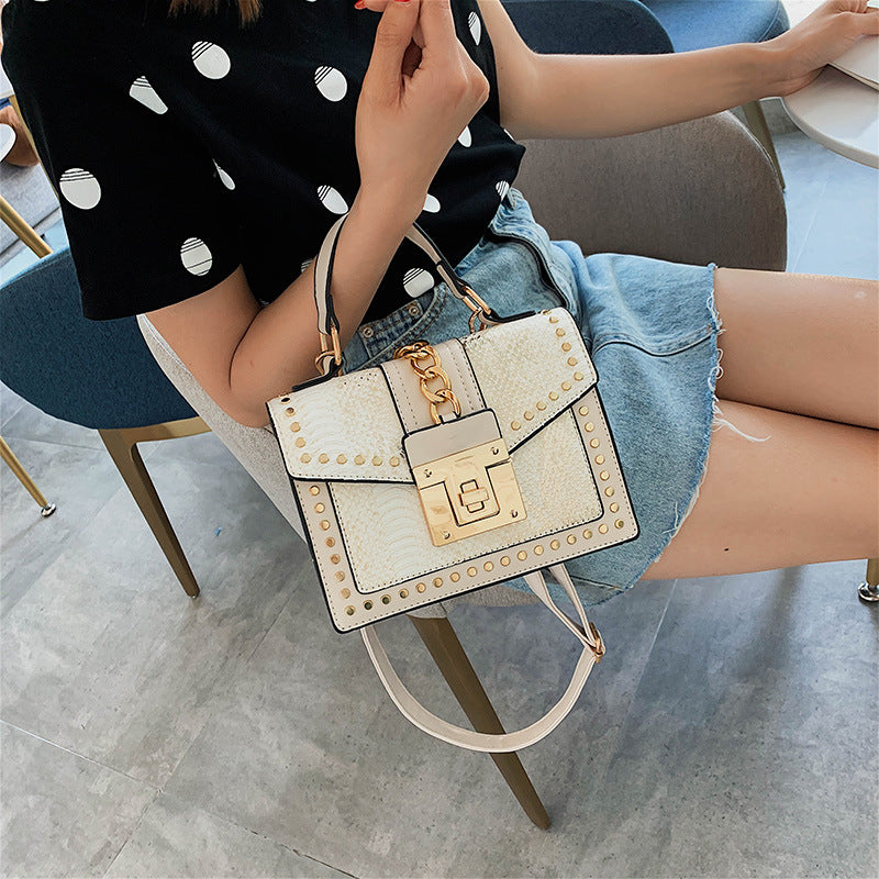 Fashion snake pattern handbag See size chart under “more details”