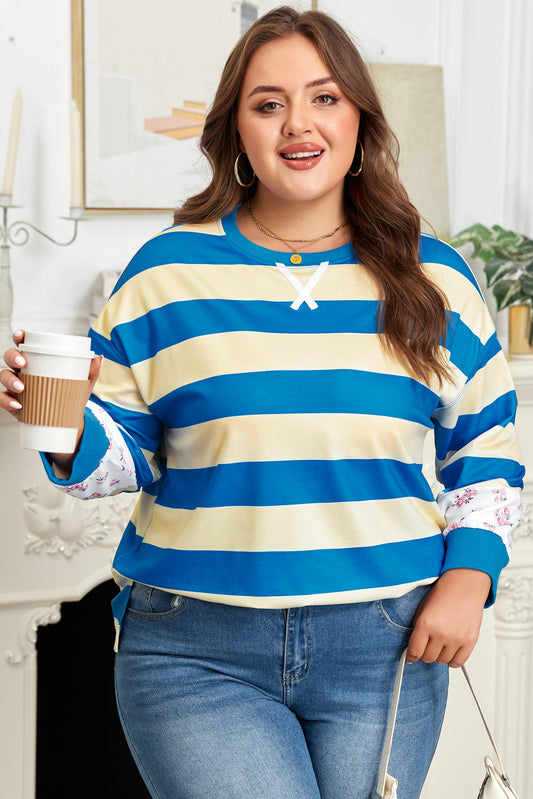Top de pull de talla grande con bloques de color floral de rayas azules y hombros caídos