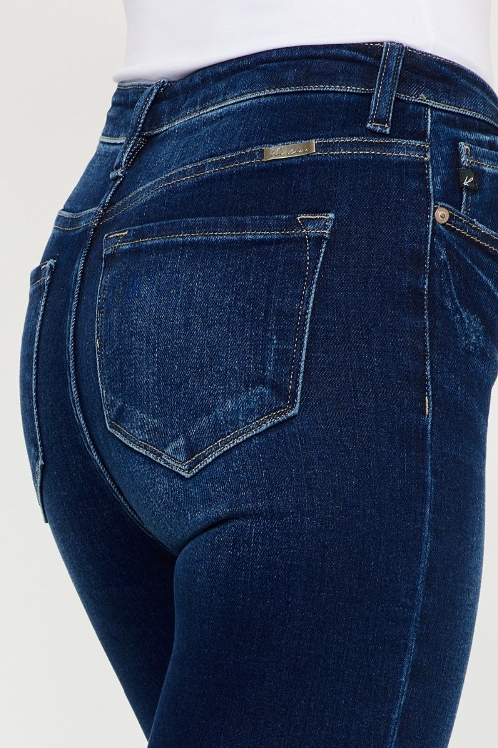 Jeans ajustados Kancan de tiro alto con dobladillo deshilachado hasta el tobillo, talla completa