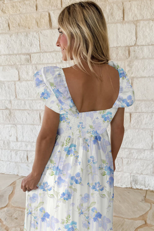 Vestido largo sin mangas con estampado floral azul cielo, smock, cintura alta y doble volante