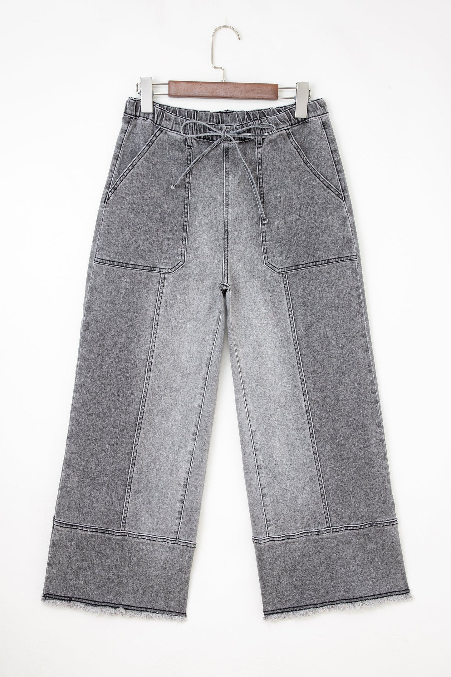 Pantalones vaqueros de pierna ancha con cordón azul de Prusia, detalle de costura y dobladillo sin rematar