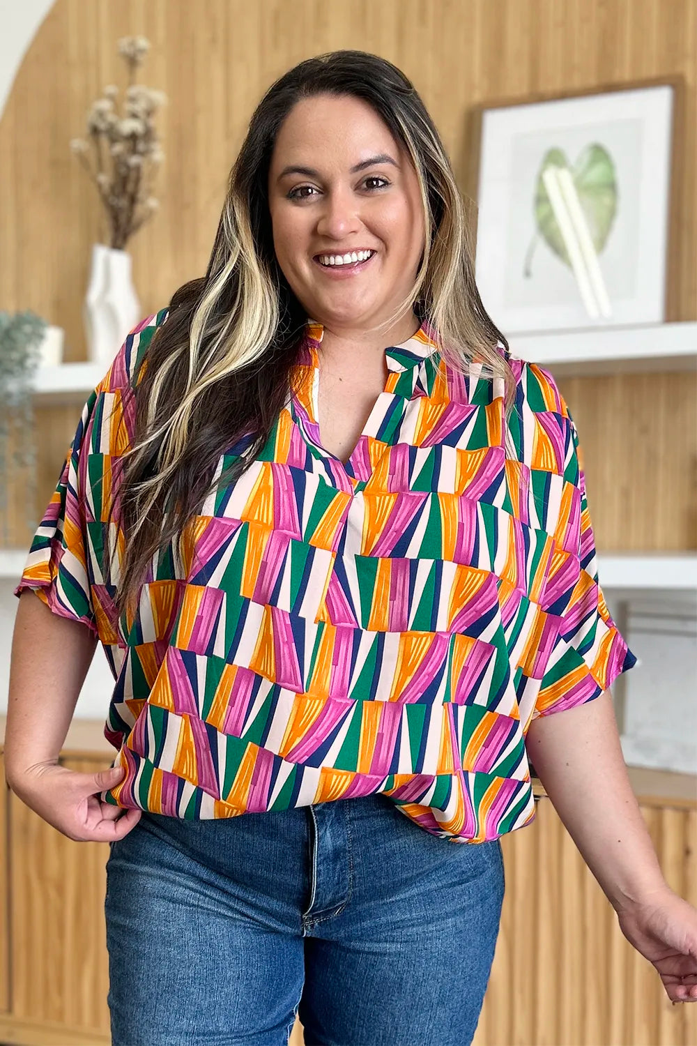 Top de manga dolman con muescas y estampado geométrico "Double Take" de talla grande