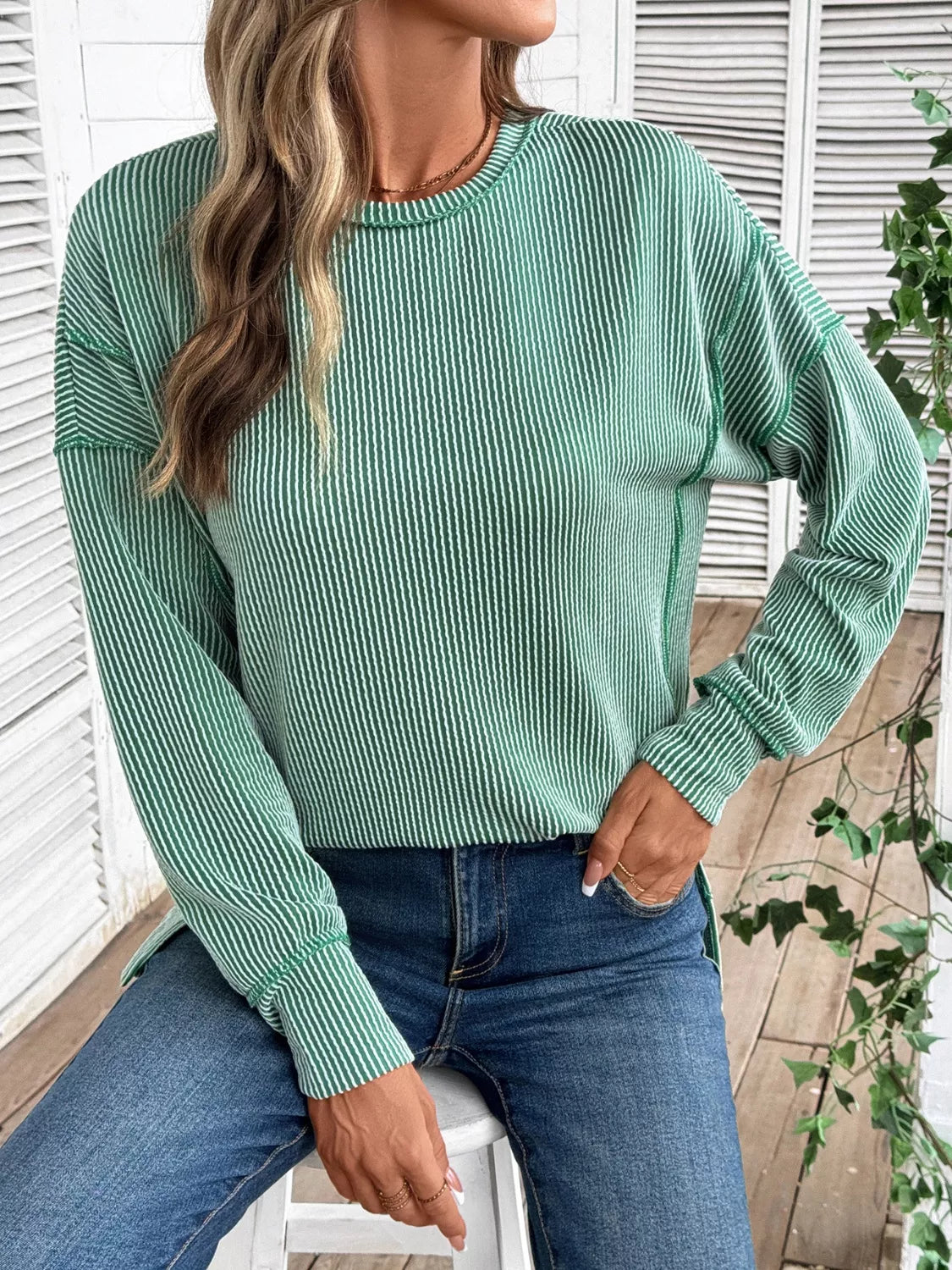 Sudadera de cuello redondo con aberturas laterales